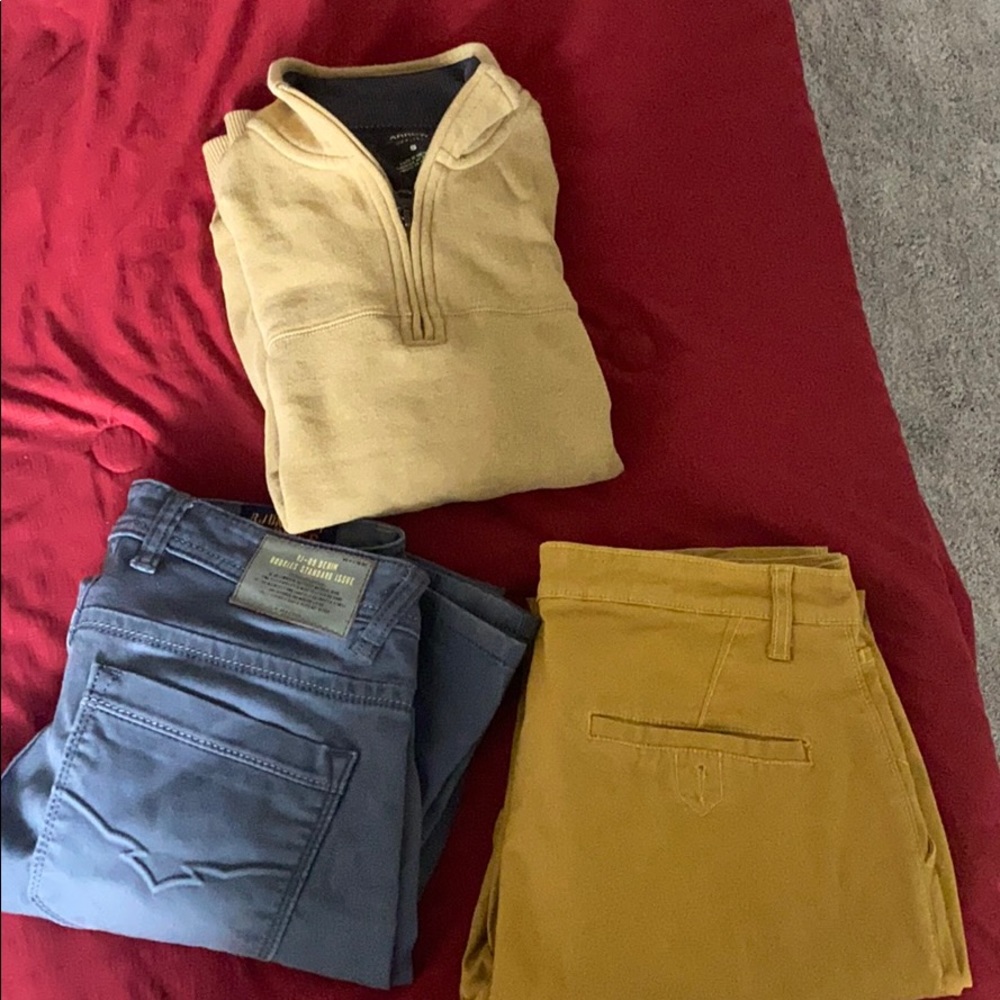 Sweat shirt and a pair of jeans